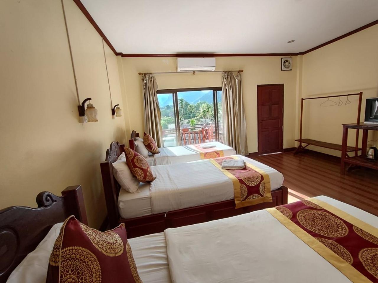 Hana Riverside Hotel Vang Vieng Exterior photo